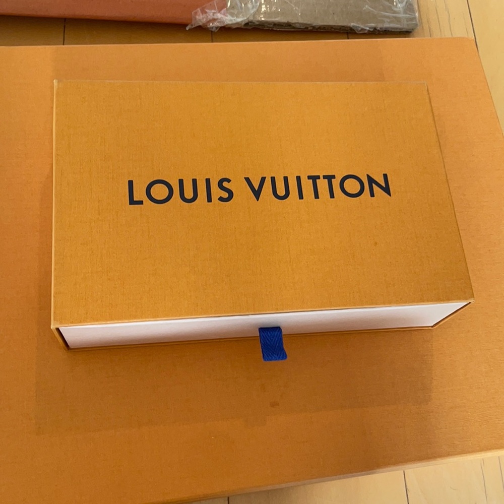 Chanel, Louis Vuitton, Gucci, hermes boxes.